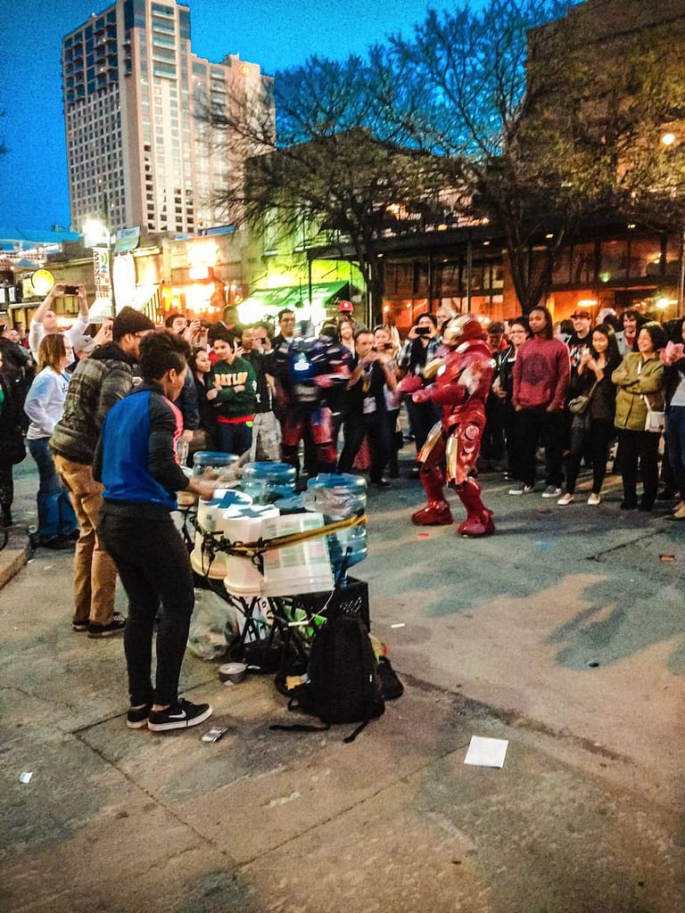 Bucket drummers were a dime a dozen on the streets of Austin, but not many feature a dancing Iron Man.